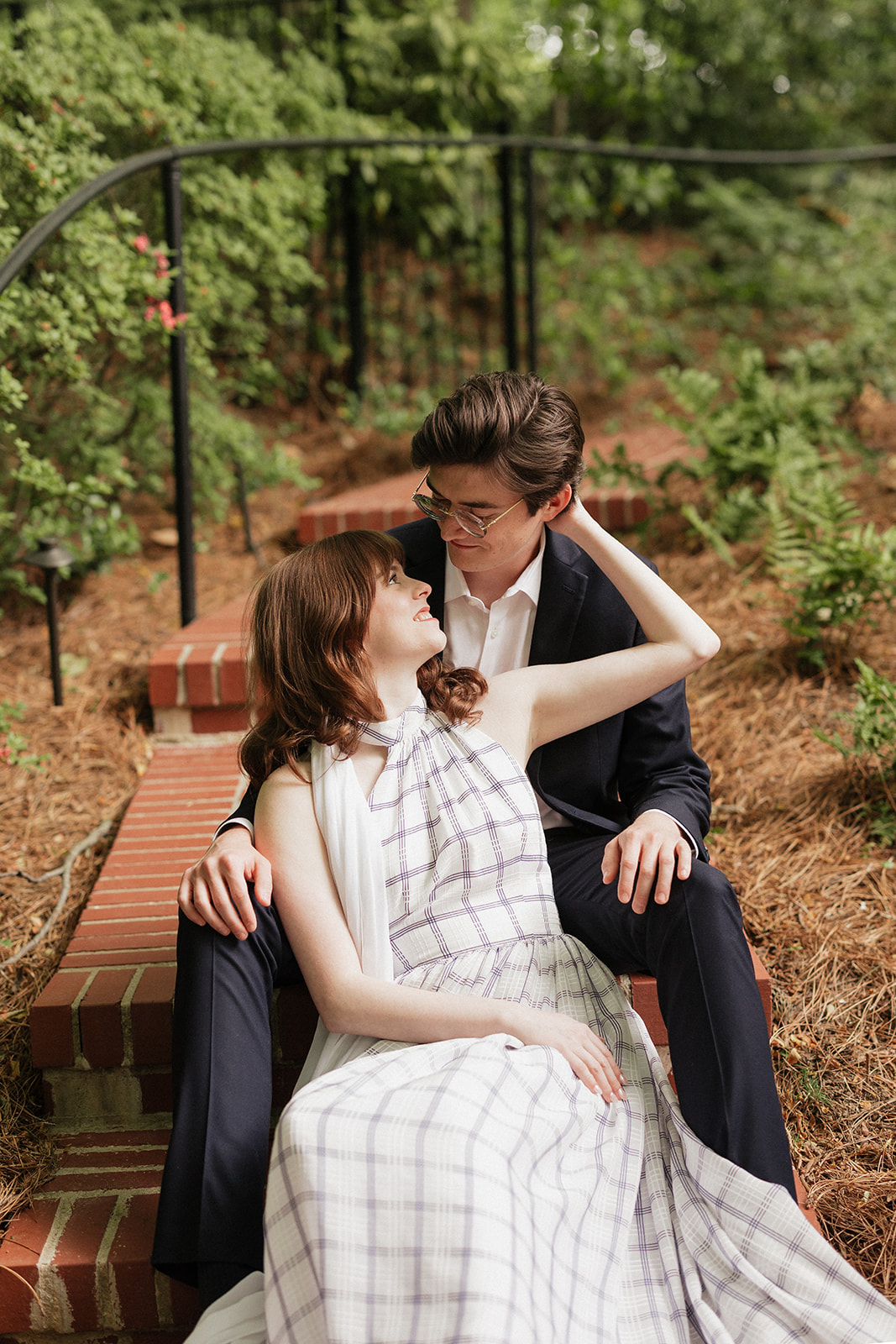 Elizabeth and Nicholas smiling together outdoors.