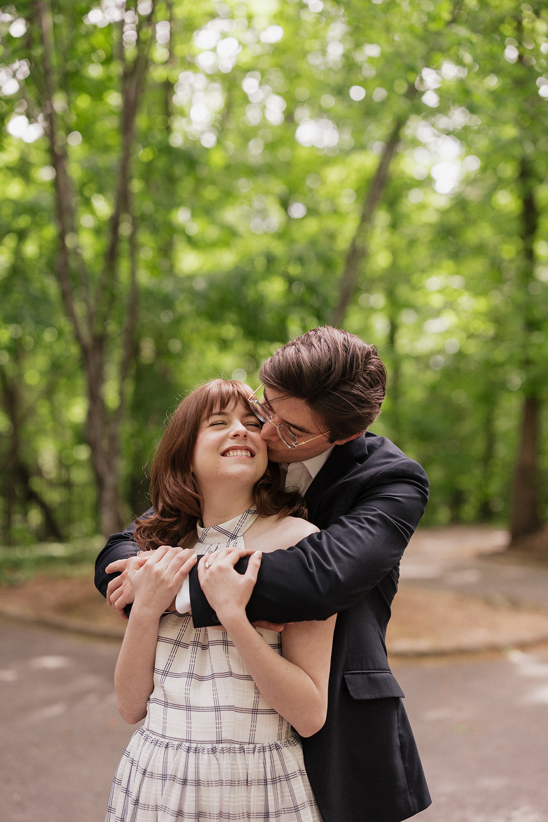 Nicholas kissing Elizabeth on the cheek.